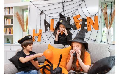 Kids decorating for Halloween.