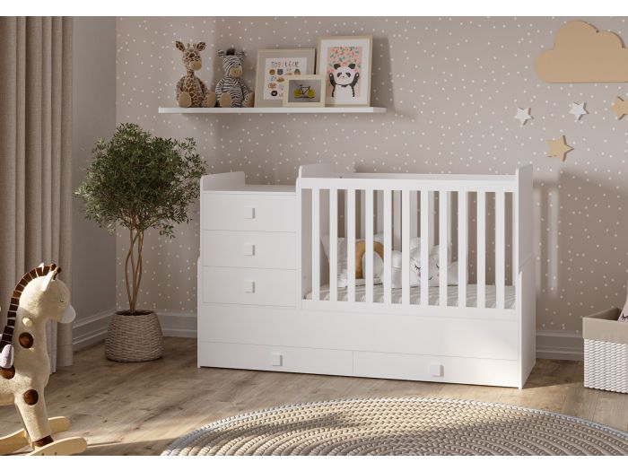 White cot with an attached changing unit and 4 drawers. Modern design. Adapts to a toddler bed. by Kidsaw